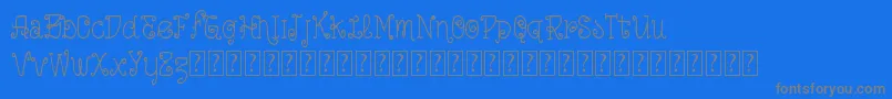 VtksLoveIsEverything-fontti – harmaat kirjasimet sinisellä taustalla