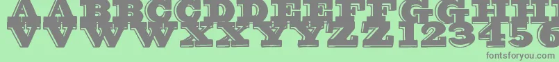 GroovyFont Font – Gray Fonts on Green Background