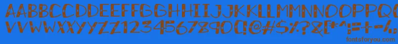 SnowySparkles Font – Brown Fonts on Blue Background