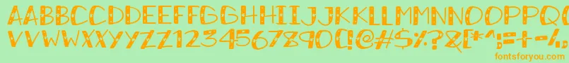 SnowySparkles Font – Orange Fonts on Green Background