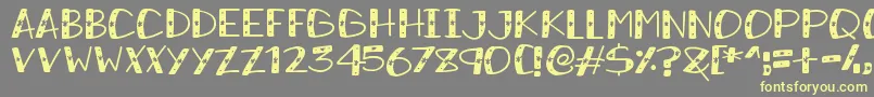SnowySparkles Font – Yellow Fonts on Gray Background