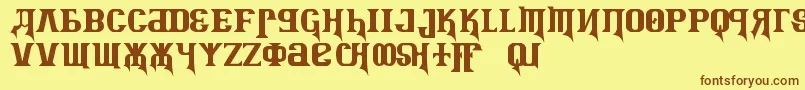 KremlinAdvisorDisplayKapsBold Font – Brown Fonts on Yellow Background