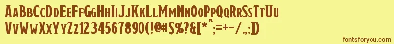フォントDraconis – 茶色の文字が黄色の背景にあります。