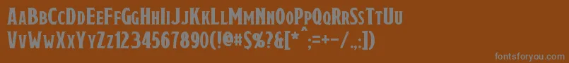 フォントDraconis – 茶色の背景に灰色の文字