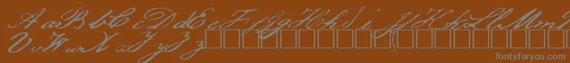 Jefferson-fontti – harmaat kirjasimet ruskealla taustalla