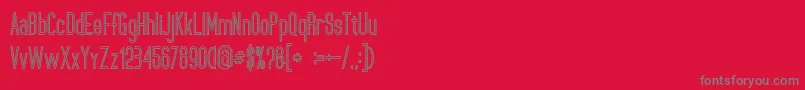 フォントUltimatumBoldLine – 赤い背景に灰色の文字