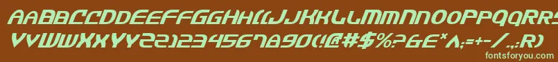 JannisariesItalic-fontti – vihreät fontit ruskealla taustalla