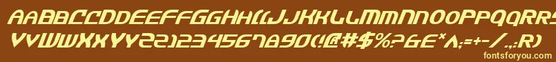 JannisariesItalic-fontti – keltaiset fontit ruskealla taustalla