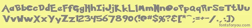 Ketchum-fontti – harmaat kirjasimet keltaisella taustalla