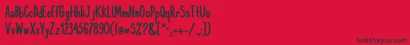 フォントKomixconBold – 赤い背景に黒い文字