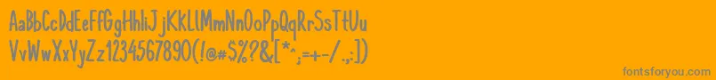 フォントKomixconBold – オレンジの背景に灰色の文字