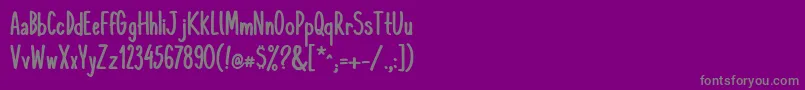 フォントKomixconBold – 紫の背景に灰色の文字