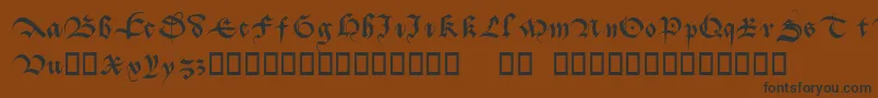 Batarde Font – Black Fonts on Brown Background