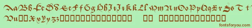 Batarde-Schriftart – Braune Schriften auf grünem Hintergrund