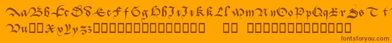Batarde-Schriftart – Braune Schriften auf orangefarbenem Hintergrund