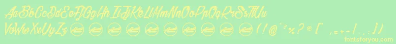 BethanieSnakePersonaluseonly Font – Yellow Fonts on Green Background