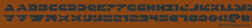 Triggermanexpand Font – Black Fonts on Brown Background