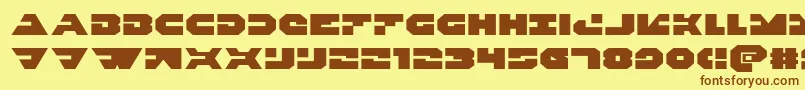 Triggermanexpand Font – Brown Fonts on Yellow Background