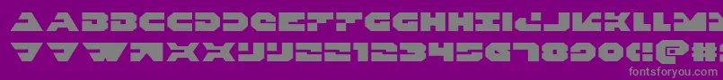 Triggermanexpand-fontti – harmaat kirjasimet violetilla taustalla