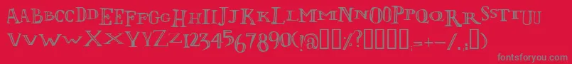 Lolii-fontti – harmaat kirjasimet punaisella taustalla