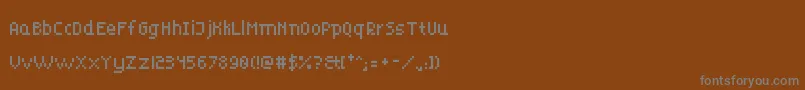 Шрифт PukeForce8 – серые шрифты на коричневом фоне