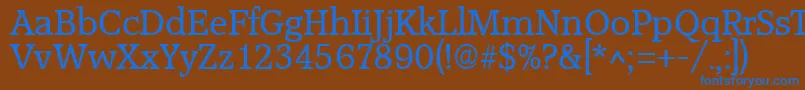 AccoladeRegular Font – Blue Fonts on Brown Background