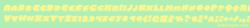 フォントBalastaralpunchital – 黄色の文字が緑の背景にあります