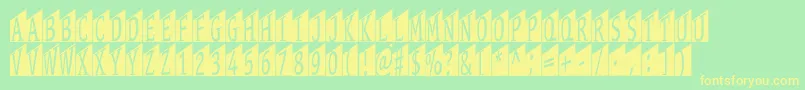 Stageglyphstwo-Schriftart – Gelbe Schriften auf grünem Hintergrund