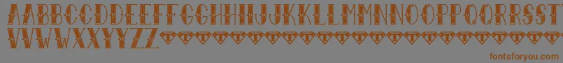 SailorLarryExtraFancy-fontti – ruskeat fontit harmaalla taustalla