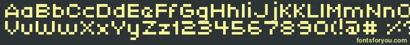 Czcionka XpaiderPixelExplosion01 – żółte czcionki na czarnym tle
