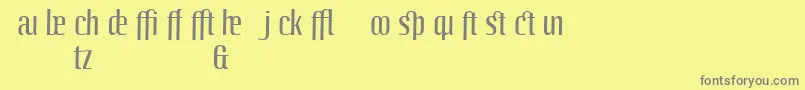 LinotypeoctaneRegularadd-fontti – harmaat kirjasimet keltaisella taustalla