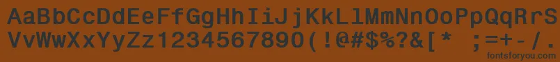 フォントGallowsPole3 – 黒い文字が茶色の背景にあります