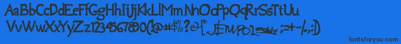 Jempolfreak Font – Black Fonts on Blue Background