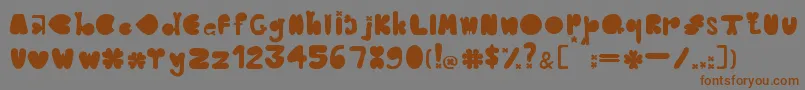Fonte CloverTypefaceBernadetLivianeyB.42413085 – fontes marrons em um fundo cinza