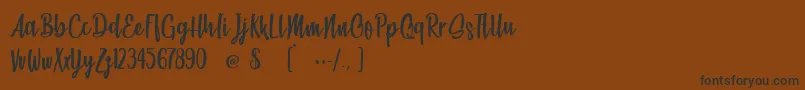 BeachSocietyLight Font – Black Fonts on Brown Background