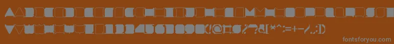 MinimalxRegular-Schriftart – Graue Schriften auf braunem Hintergrund