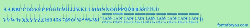 LadyFiesta-fontti – siniset fontit vihreällä taustalla