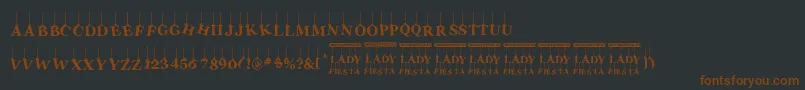 Шрифт LadyFiesta – коричневые шрифты на чёрном фоне