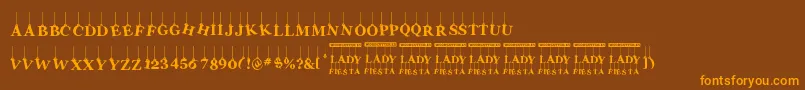 フォントLadyFiesta – オレンジ色の文字が茶色の背景にあります。