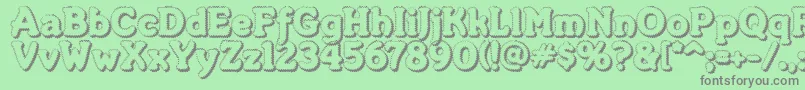Merkinf Font – Gray Fonts on Green Background