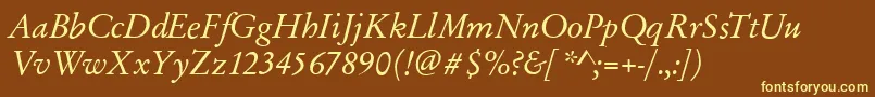 GarfeldOriginalItalic-fontti – keltaiset fontit ruskealla taustalla