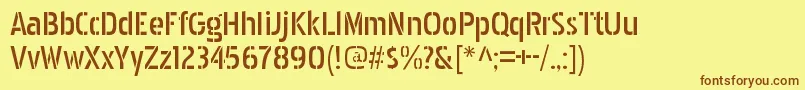 Шрифт PakenhamstencilRegular – коричневые шрифты на жёлтом фоне