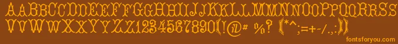 LeBourgetСЃ Font – Orange Fonts on Brown Background