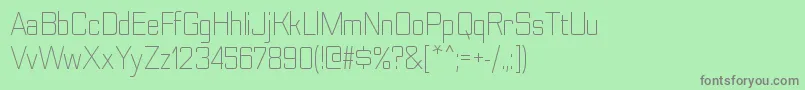 フォントNesobritescltRegular – 緑の背景に灰色の文字