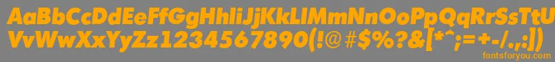 MontrealserialHeavyItalic-Schriftart – Orangefarbene Schriften auf grauem Hintergrund