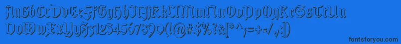 fuente TypographergotischSchattenS – Fuentes Negras Sobre Fondo Azul