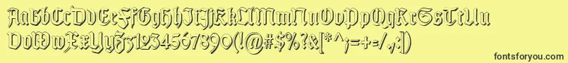 Fonte TypographergotischSchattenS – fontes pretas em um fundo amarelo