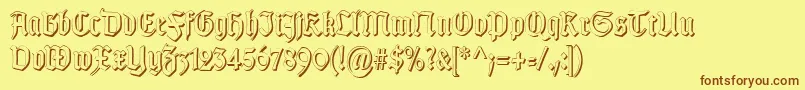 Fonte TypographergotischSchattenS – fontes marrons em um fundo amarelo