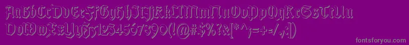 Fonte TypographergotischSchattenS – fontes cinzas em um fundo violeta