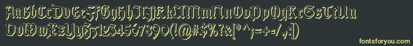 Шрифт TypographergotischSchattenS – жёлтые шрифты на чёрном фоне